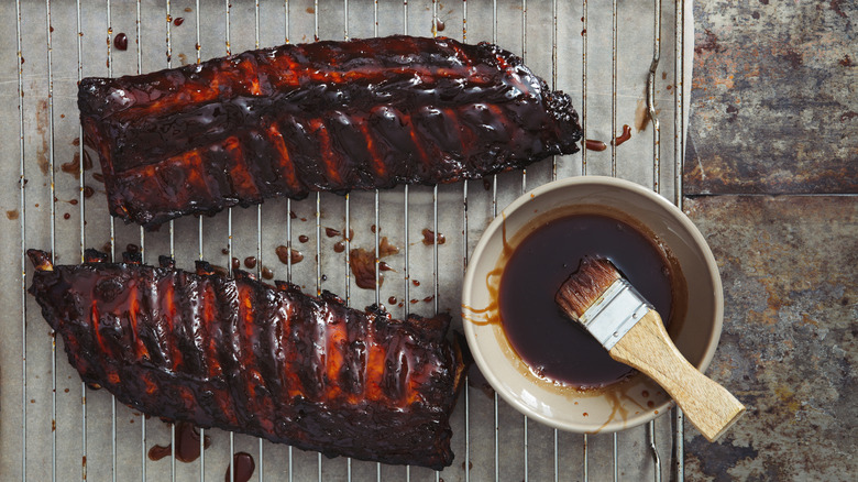 Ribs covered in BBQ sauce