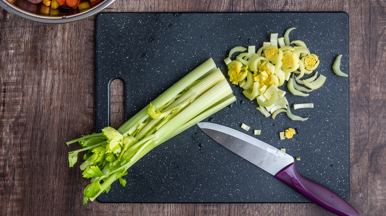 Chopped celery on cutting board