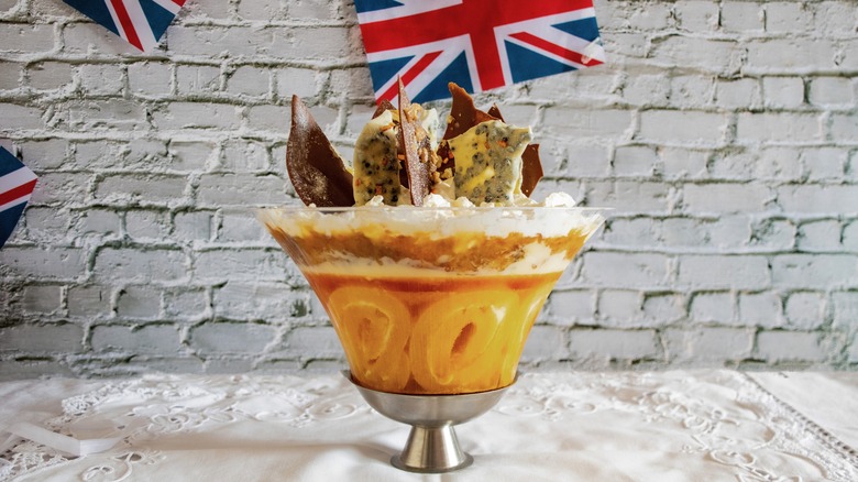 A trifle surrounded by British flags