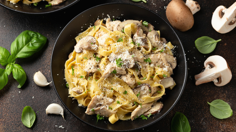 Mushroom pasta on dark background