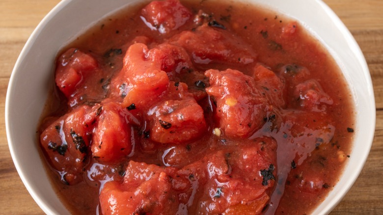 Fire roasted tomatoes in a white bowl