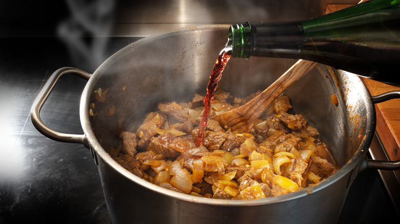 Wine being poured into pot