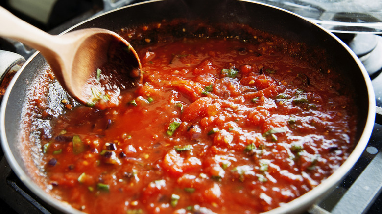 tomato sauce cooking in pan