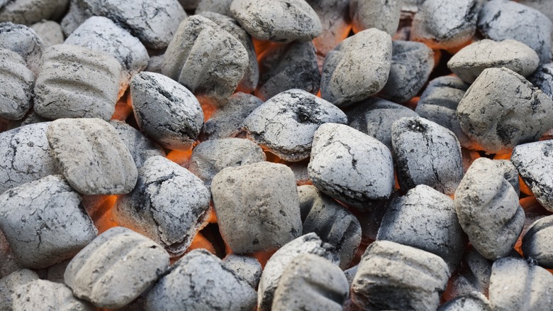 White hot charcoals on a grill