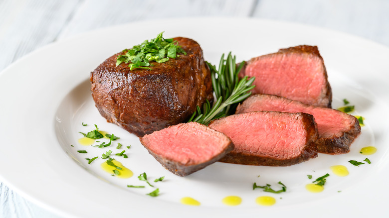 Sliced filet mignon on a plate.
