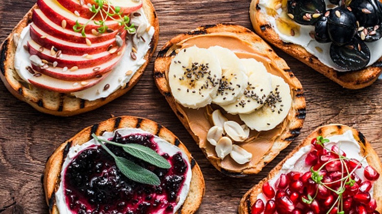 Block of goat cheese topped with oil and herbs