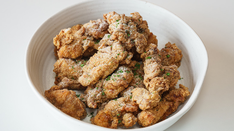 fried chicken covered in snow cheese