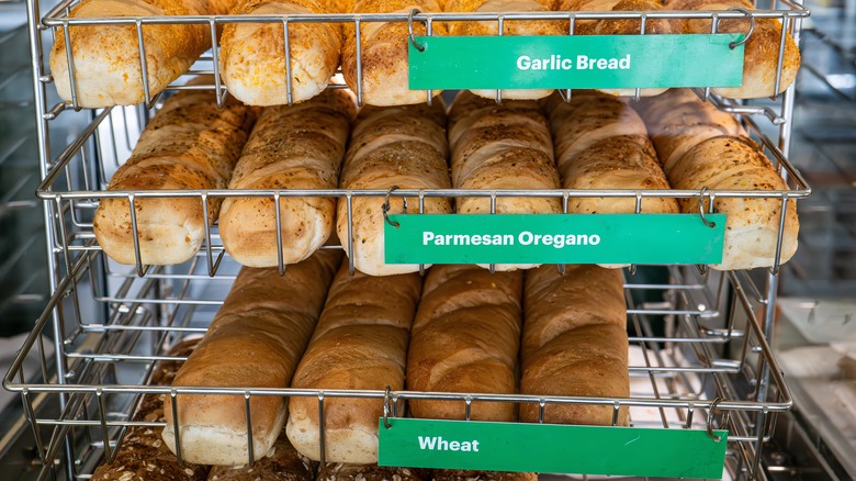 Different flavors of Subway bread on display