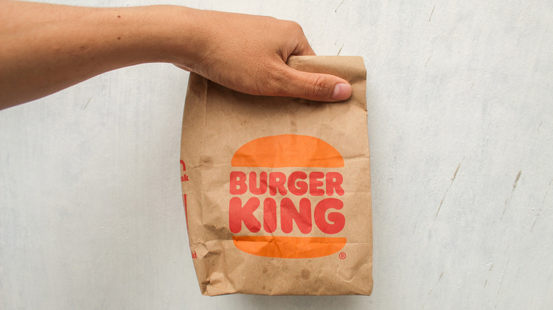 Person holding a Burger King bag