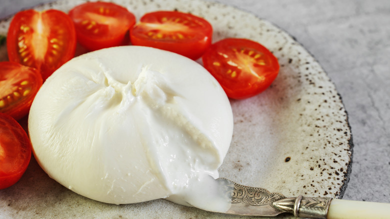 bowl of burrata with cherry tomatoes