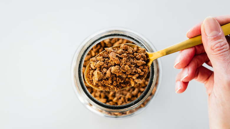 jar and spoonful of textured vegetable protein