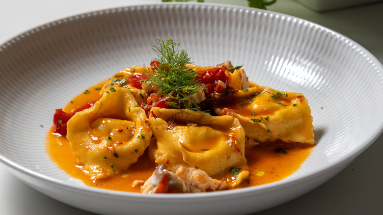 Bowl of tortellini pasta with sauce