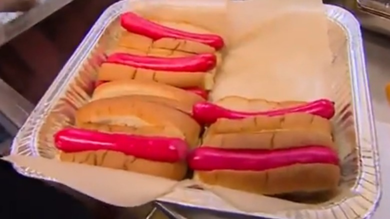 A tray of Maine red hots in buns