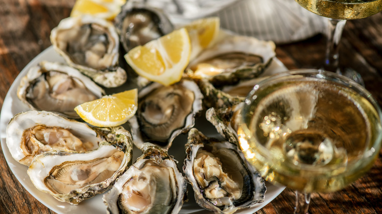 oysters on the half shell with lemons