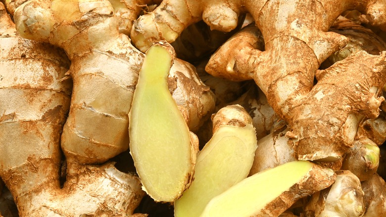 ginger roots whole and sliced