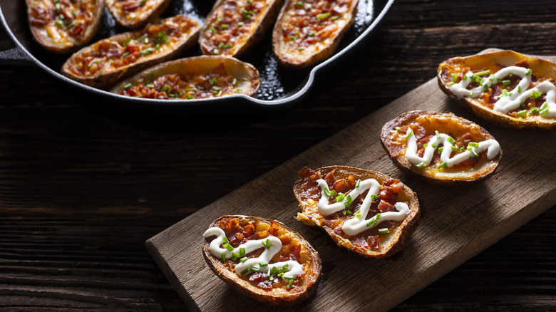 Potato skins on wooden board