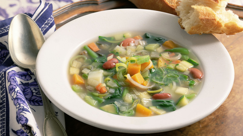 veggie soup in a white bowl