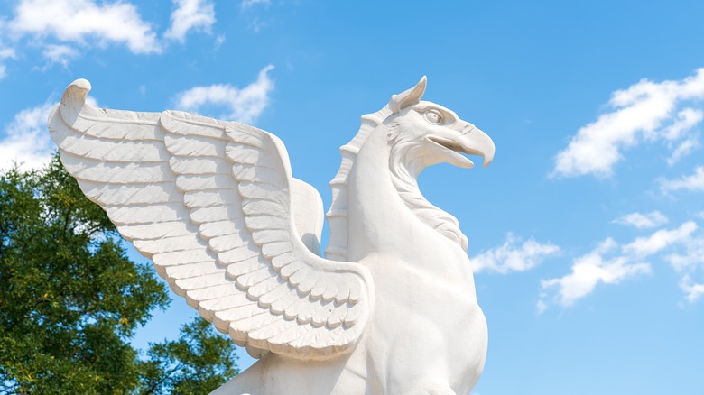 large white gryphon statue