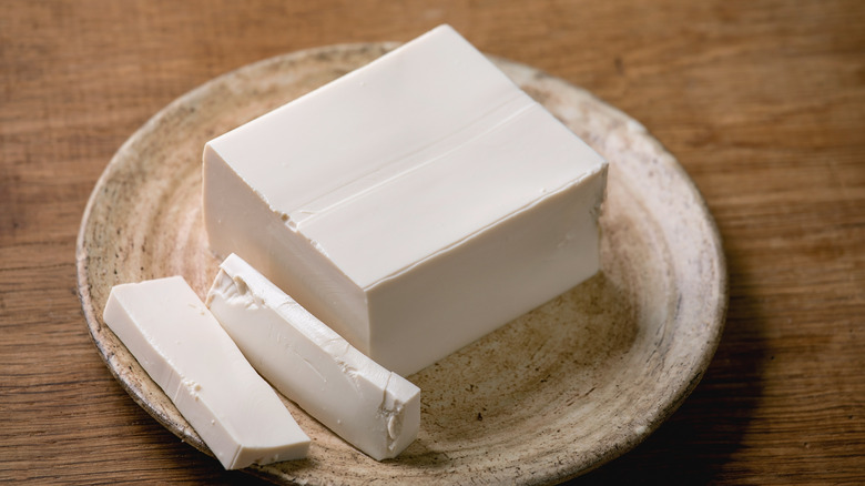 silken tofu on plate with tofu slices