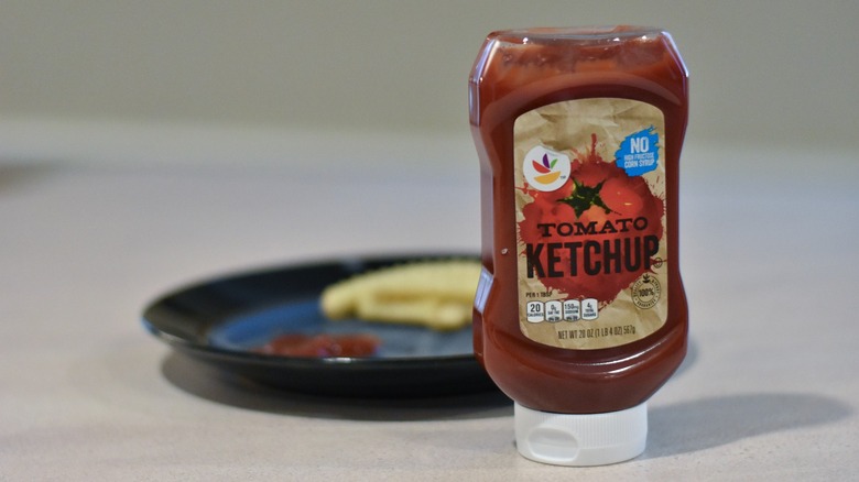 Giant tomato ketchup with fries