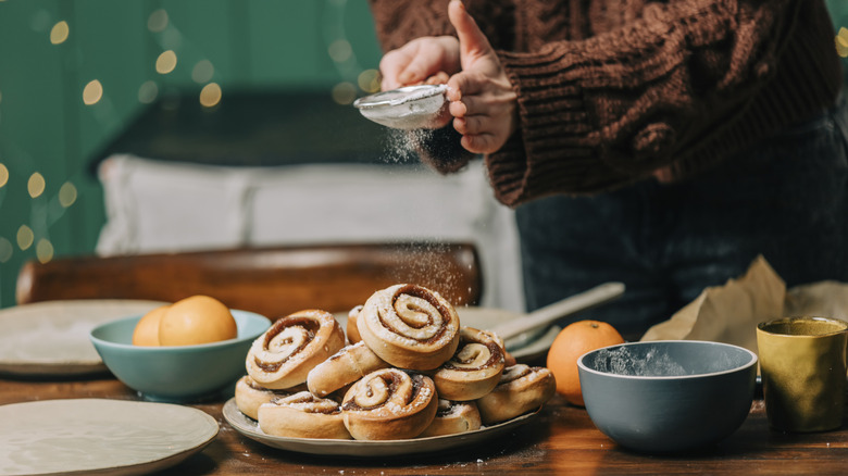 Fresh cinnamon rolls with powdered sugar