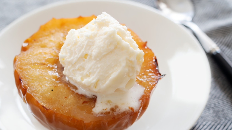 Baked apple topped with ice cream