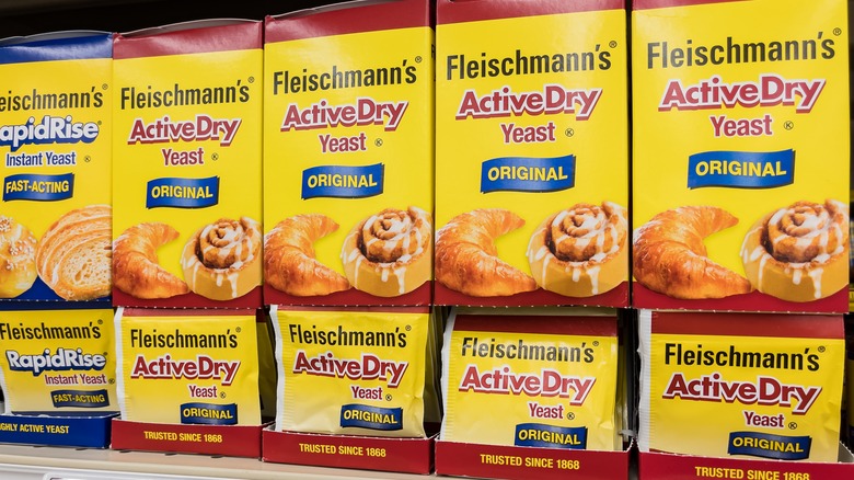 Boxes of instant yeast and active dry yeast in store