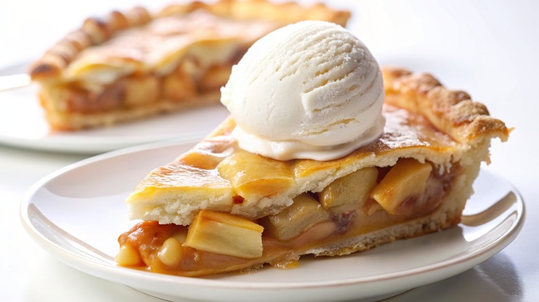 Slice of apple pie with vanilla ice cream