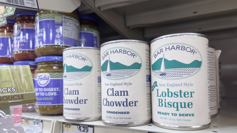 Cans of bisque and chowder on shelf