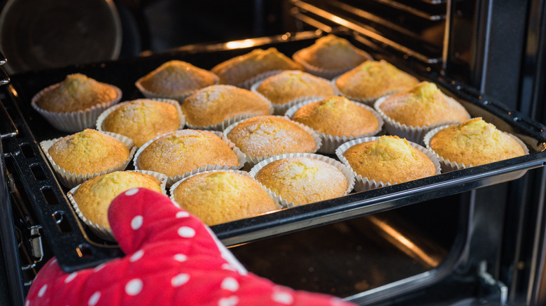 removing muffins from oven