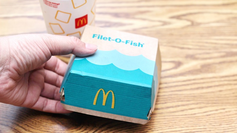 Hand holding a Filet-O-Fish box