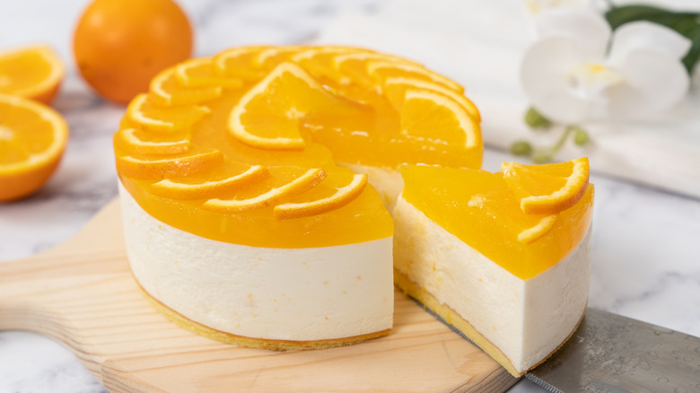 Cheesecake topped with orange curd