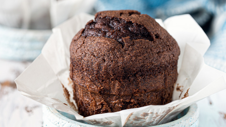 Chocolate muffin in parchment paper