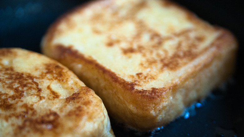 French toast cooking in pan