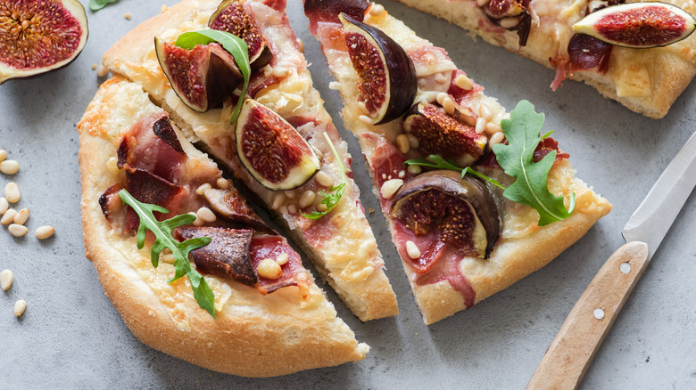Pizza topped with figs