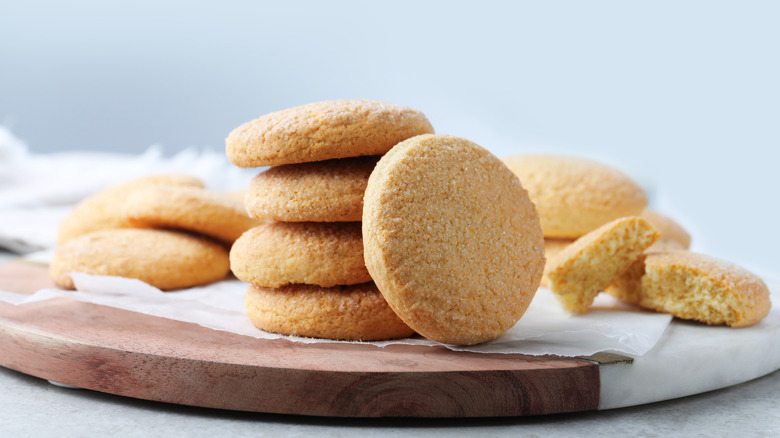 a small stack of undecorated sugar cookies