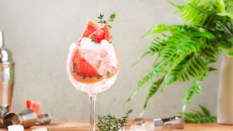 thyme sprigs in sparkling drink