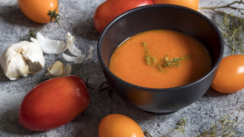 thyme garnish on tomato soup