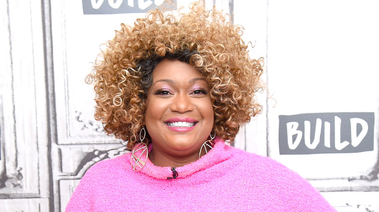 Sunny Anderson smiling at event