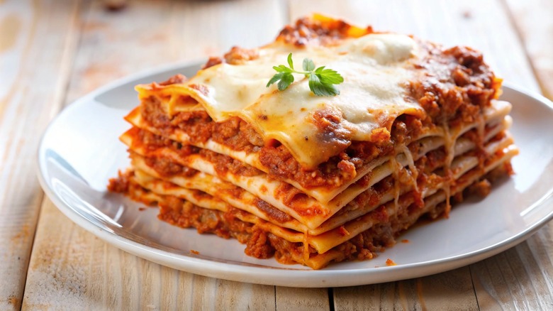 Square of lasagna on a plate