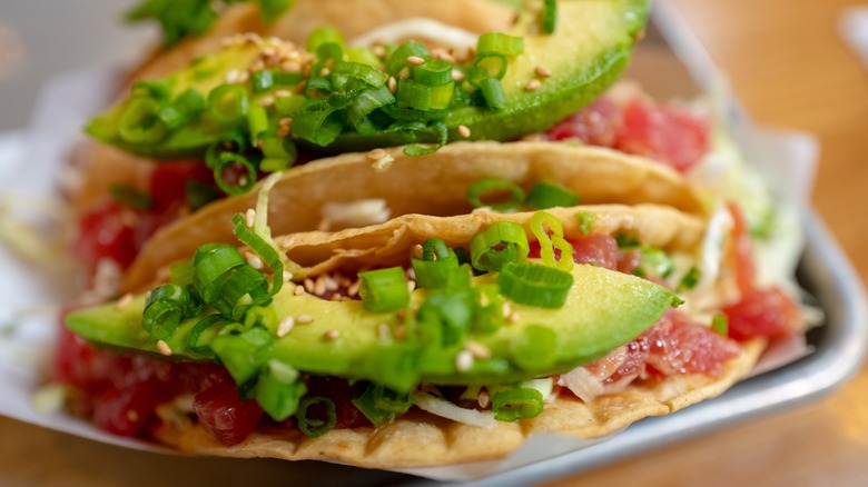 Close up of raw ahi tuna hard shell tacos