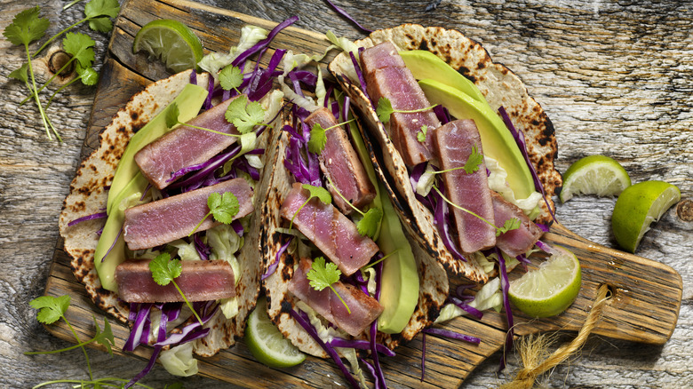 Seared ahi tuna tacos on cutting board