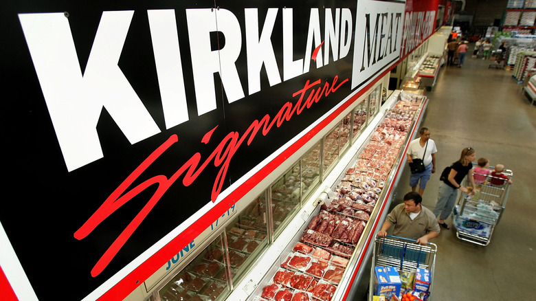 Kirkland signature sign above meat department