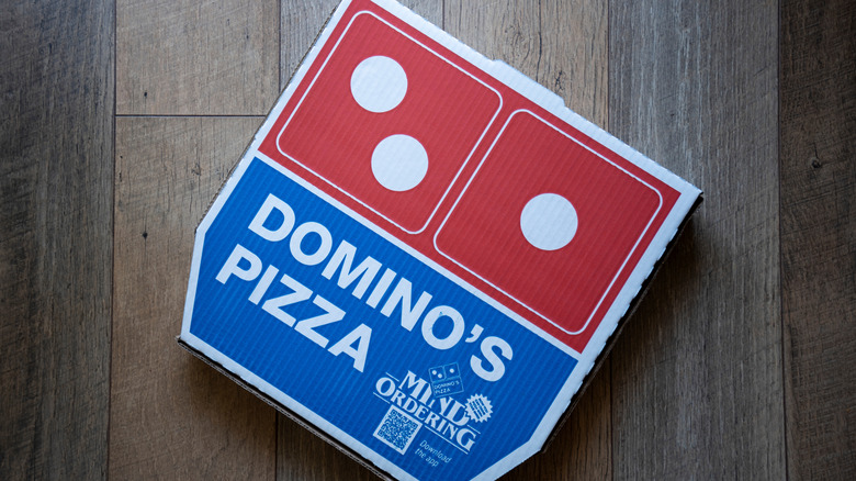 A Domino's pizza delivery box