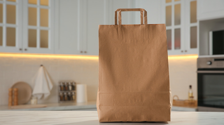 brown paper bag on a counter