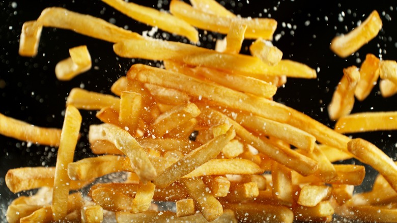 an explosion of French fries