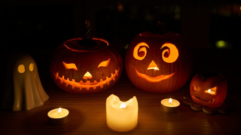 Jack-O-Lanterns by a flame