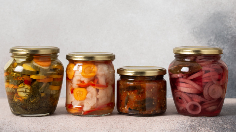 Various pickled foods in jars