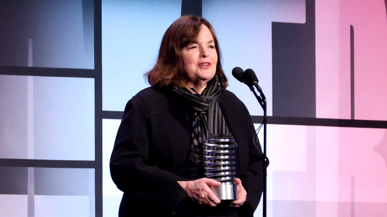 Ina Garten speaking in front of a microphone