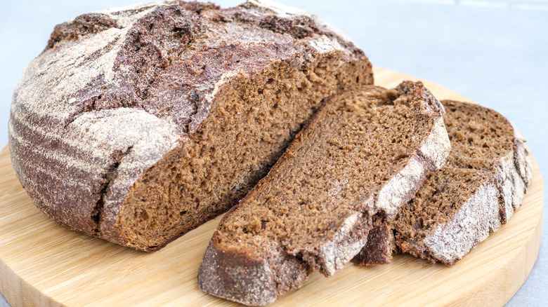 rye loaf on wooden cutting board